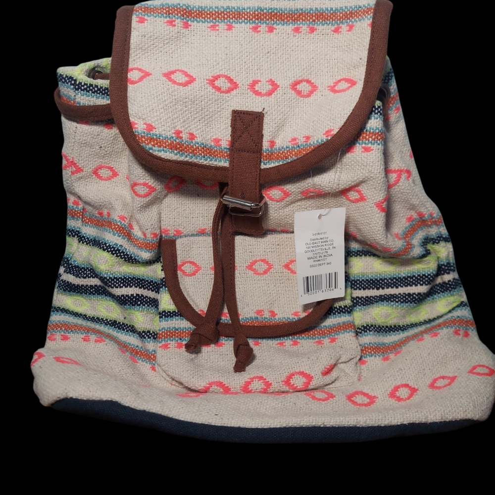 NWT Mini Backpack cream colored with a snap closure 11" wide x 12" tall